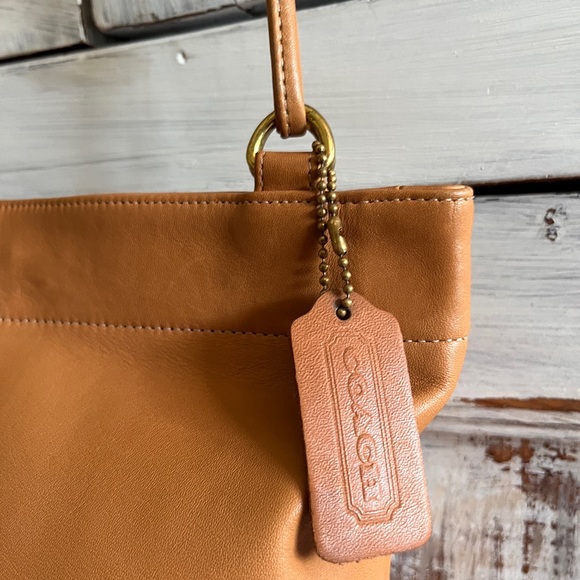 Coach Handbags - Coach beige purse. 8.5 inches wide/7 high/3.5 deep.  23 inch shoulder strap.